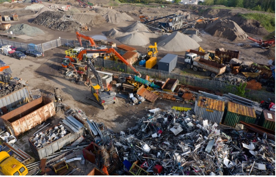 A large pile of rubble and construction equipment